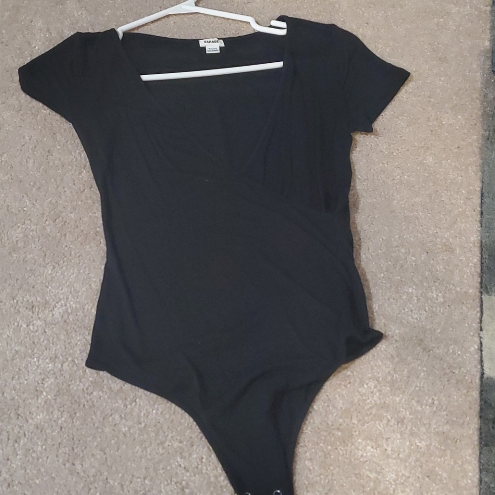 T- shirt style bodysuit with crossover bodice.